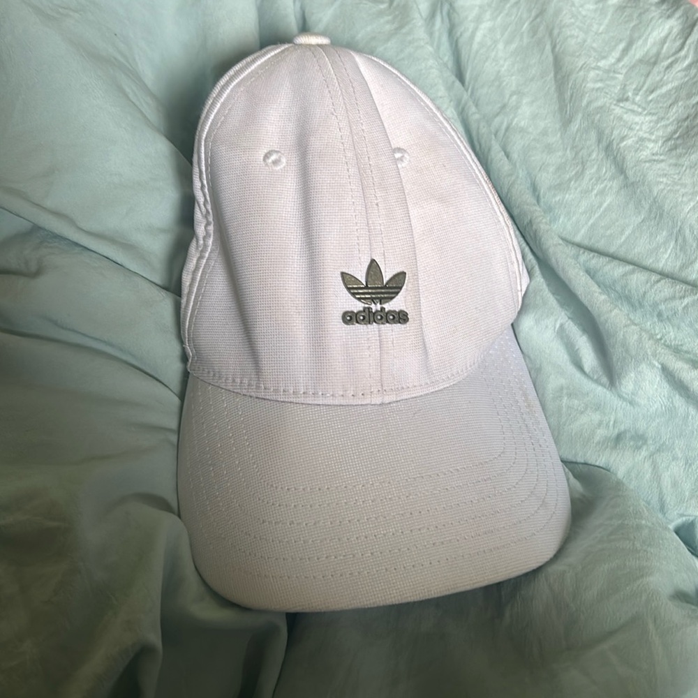 Adidas white cap.